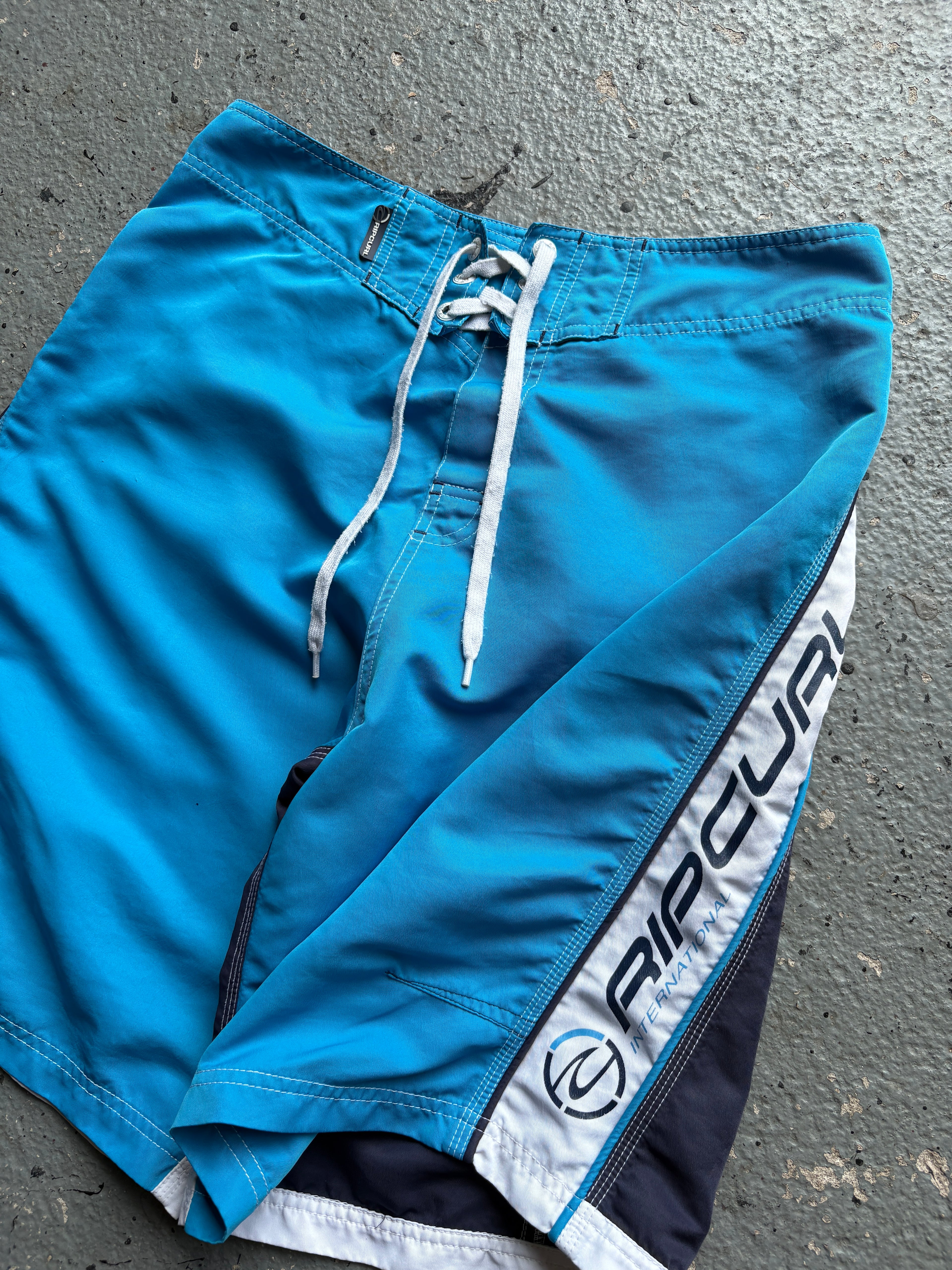 2000s Rip Curl Board Shorts Back Design Navy / Blue