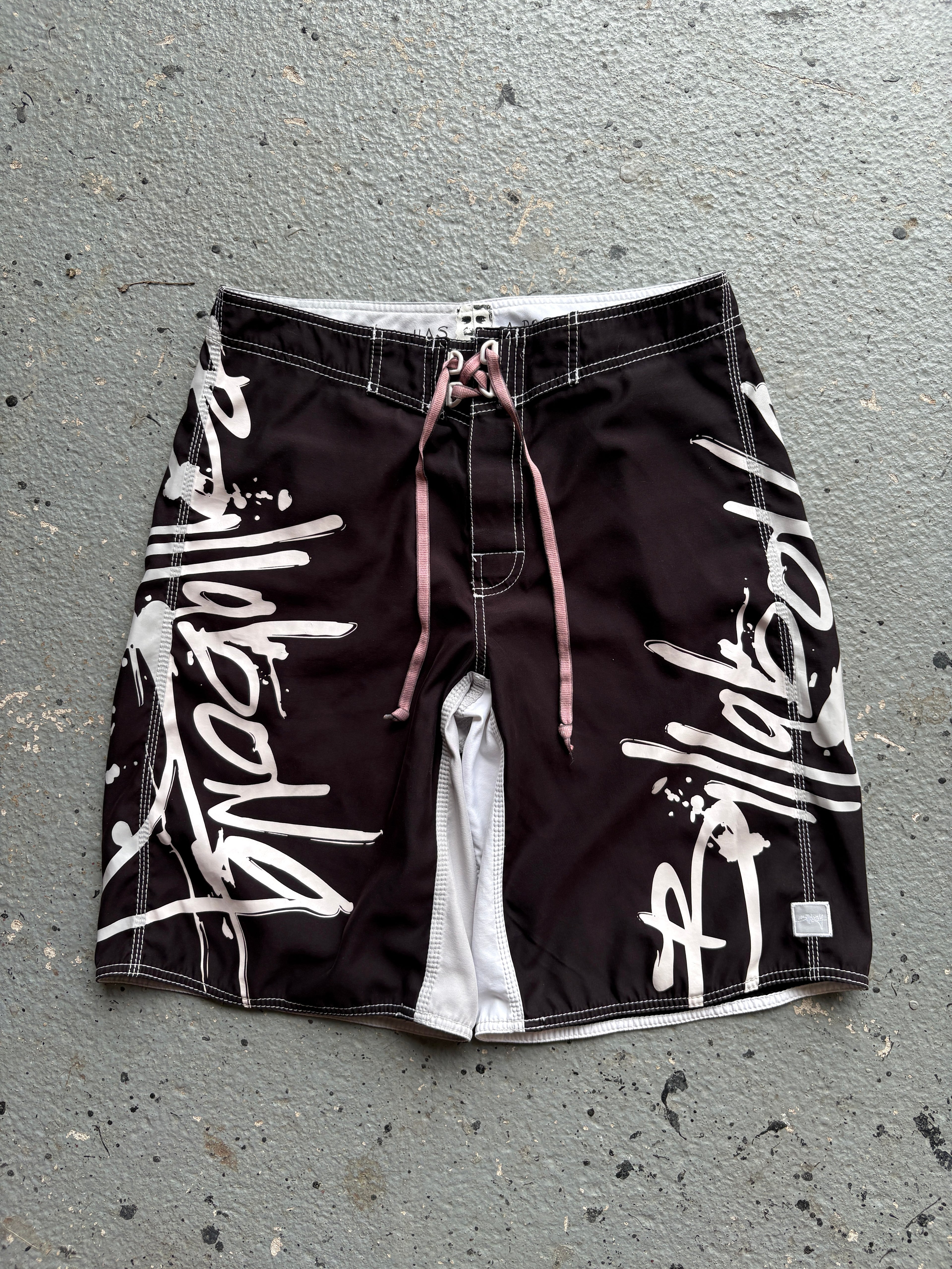 2000s Billabong "Occy Has A Possy" Board Shorts Black / White
