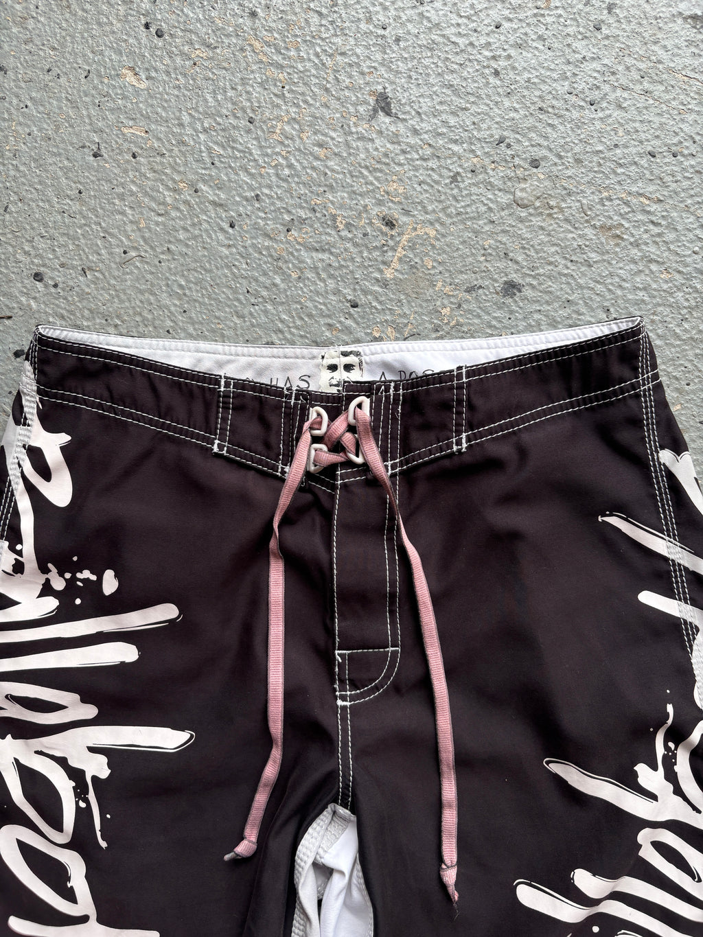 2000s Billabong "Occy Has A Possy" Board Shorts Black / White