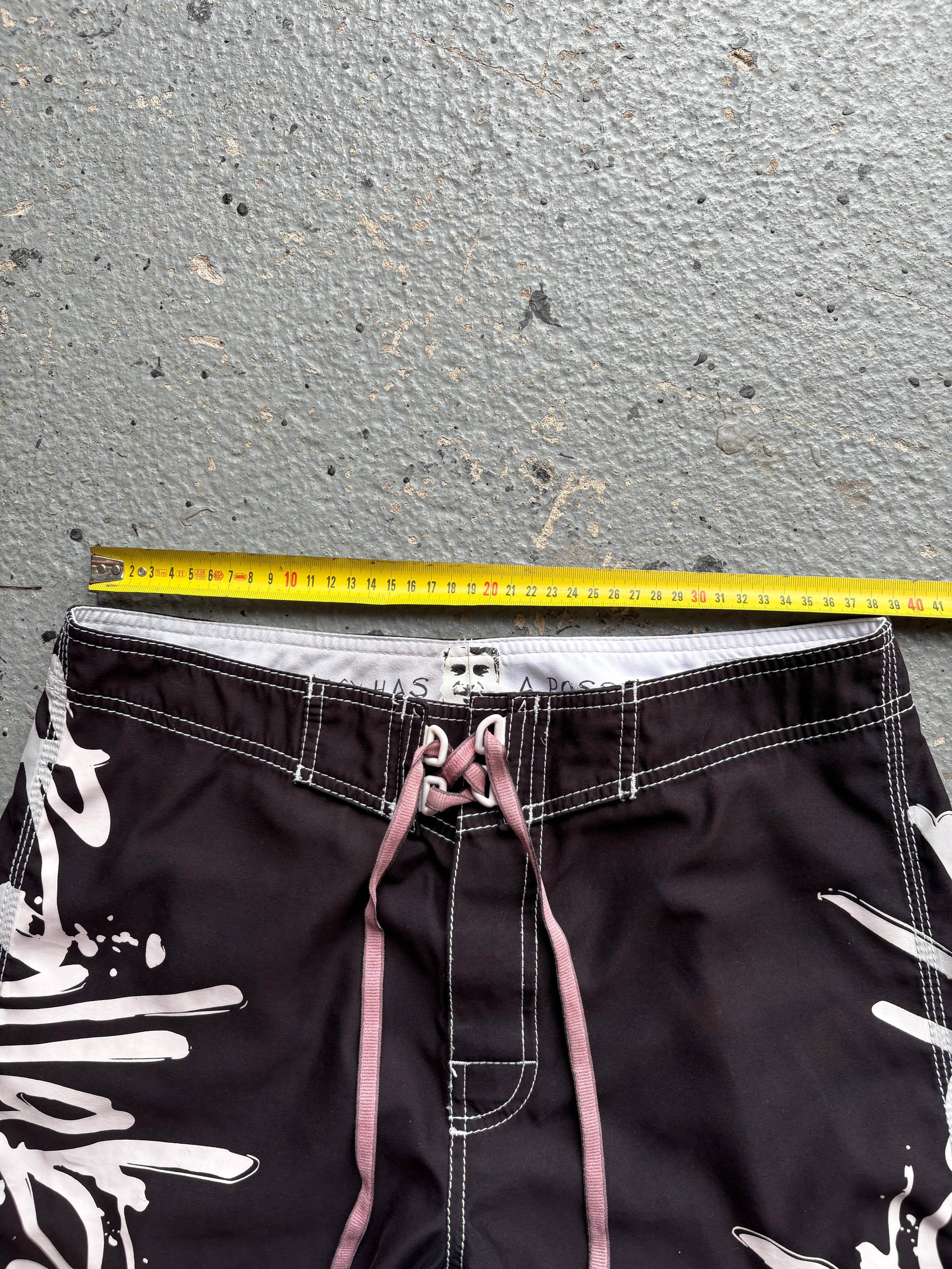 2000s Billabong "Occy Has A Possy" Board Shorts Black / White