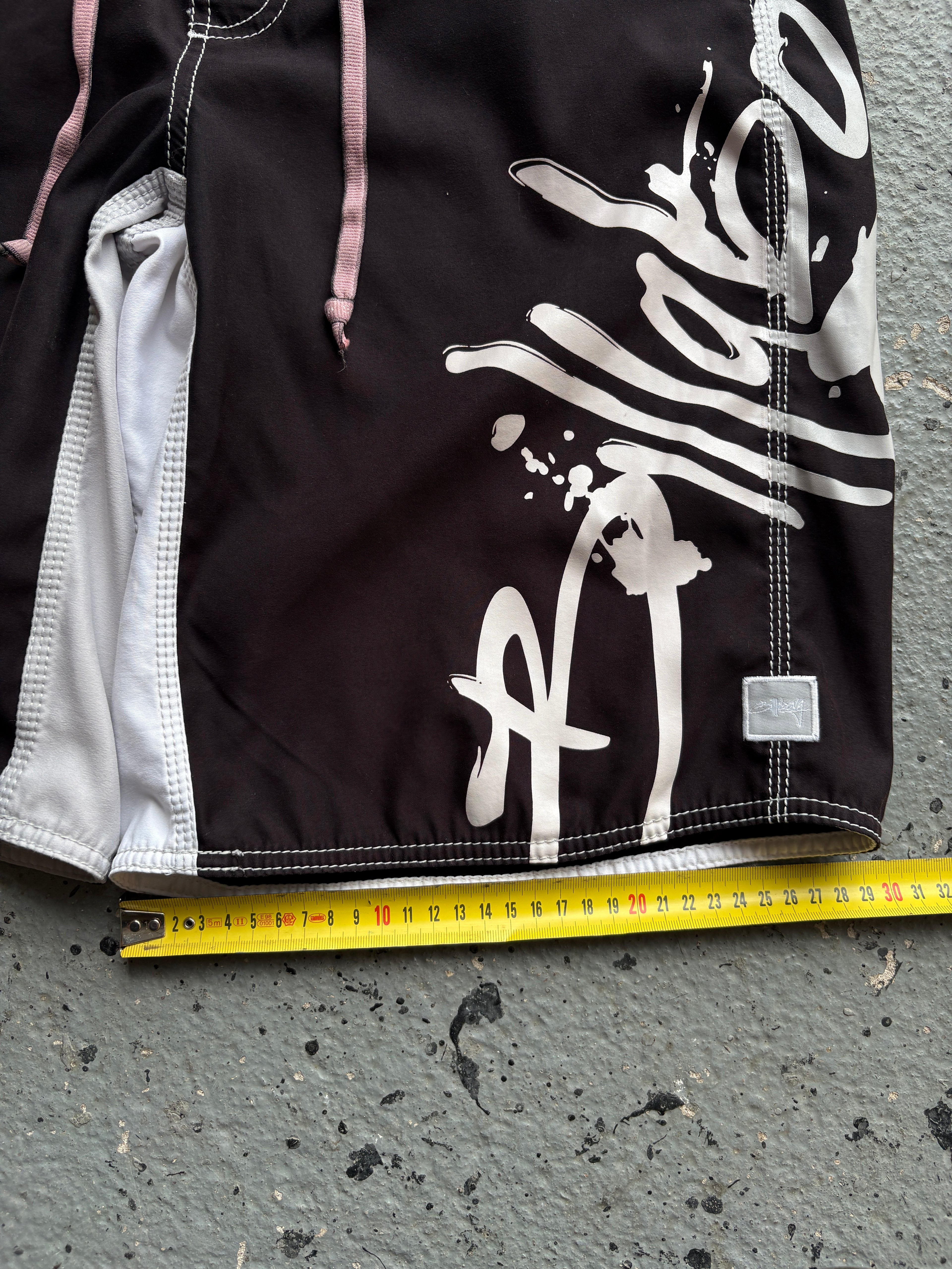 2000s Billabong "Occy Has A Possy" Board Shorts Black / White
