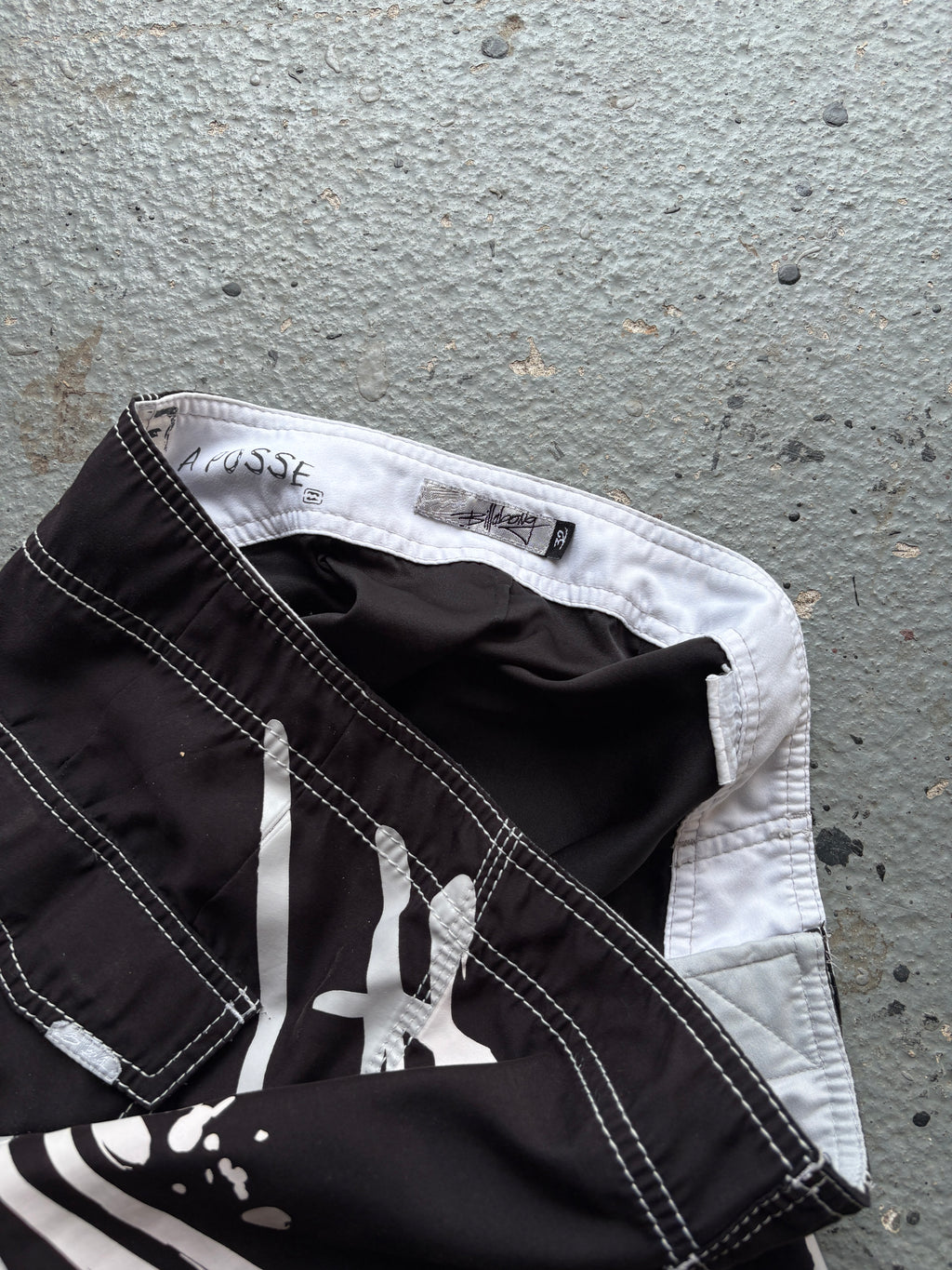 2000s Billabong "Occy Has A Possy" Board Shorts Black / White