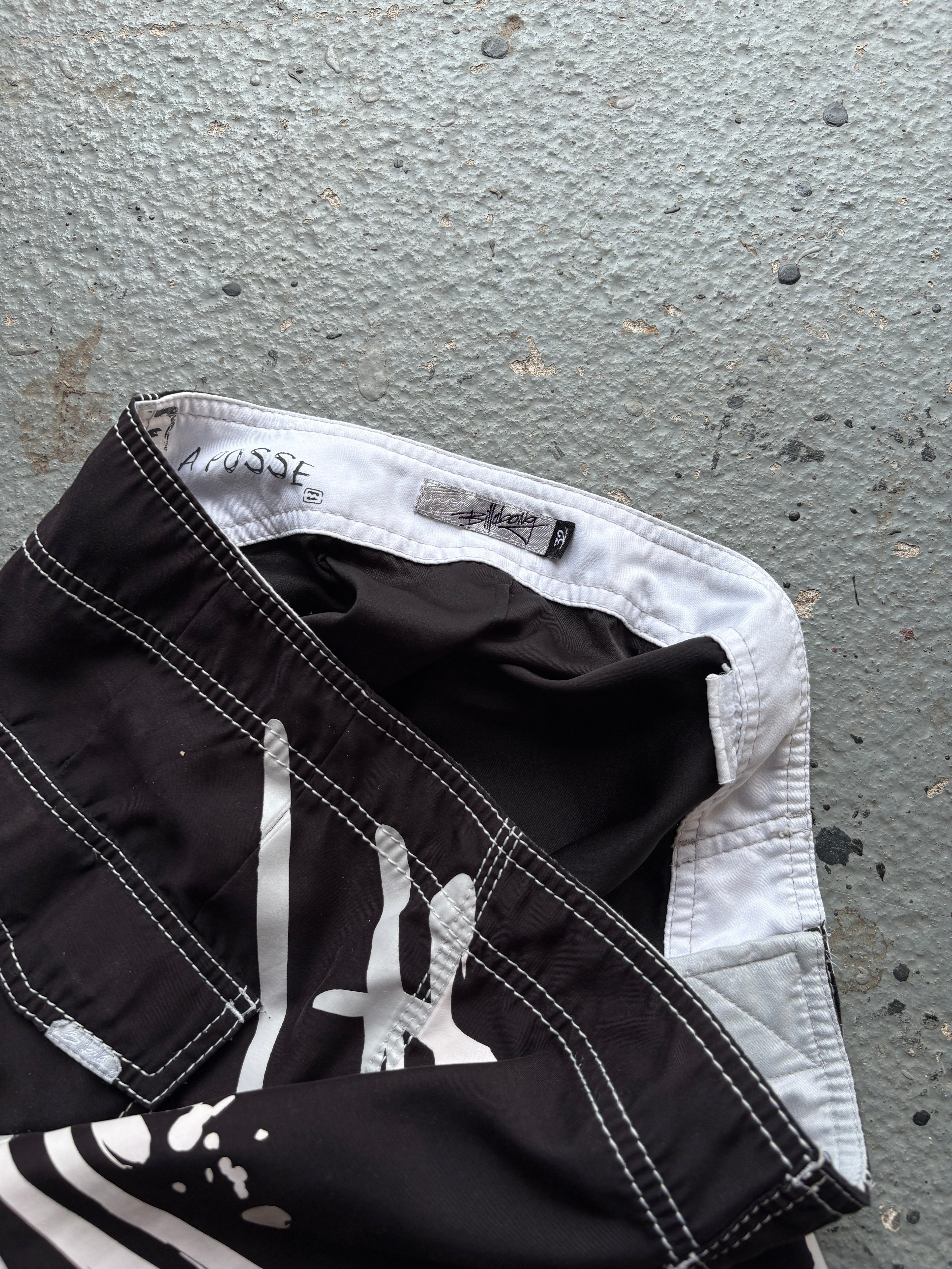 2000s Billabong "Occy Has A Possy" Board Shorts Black / White