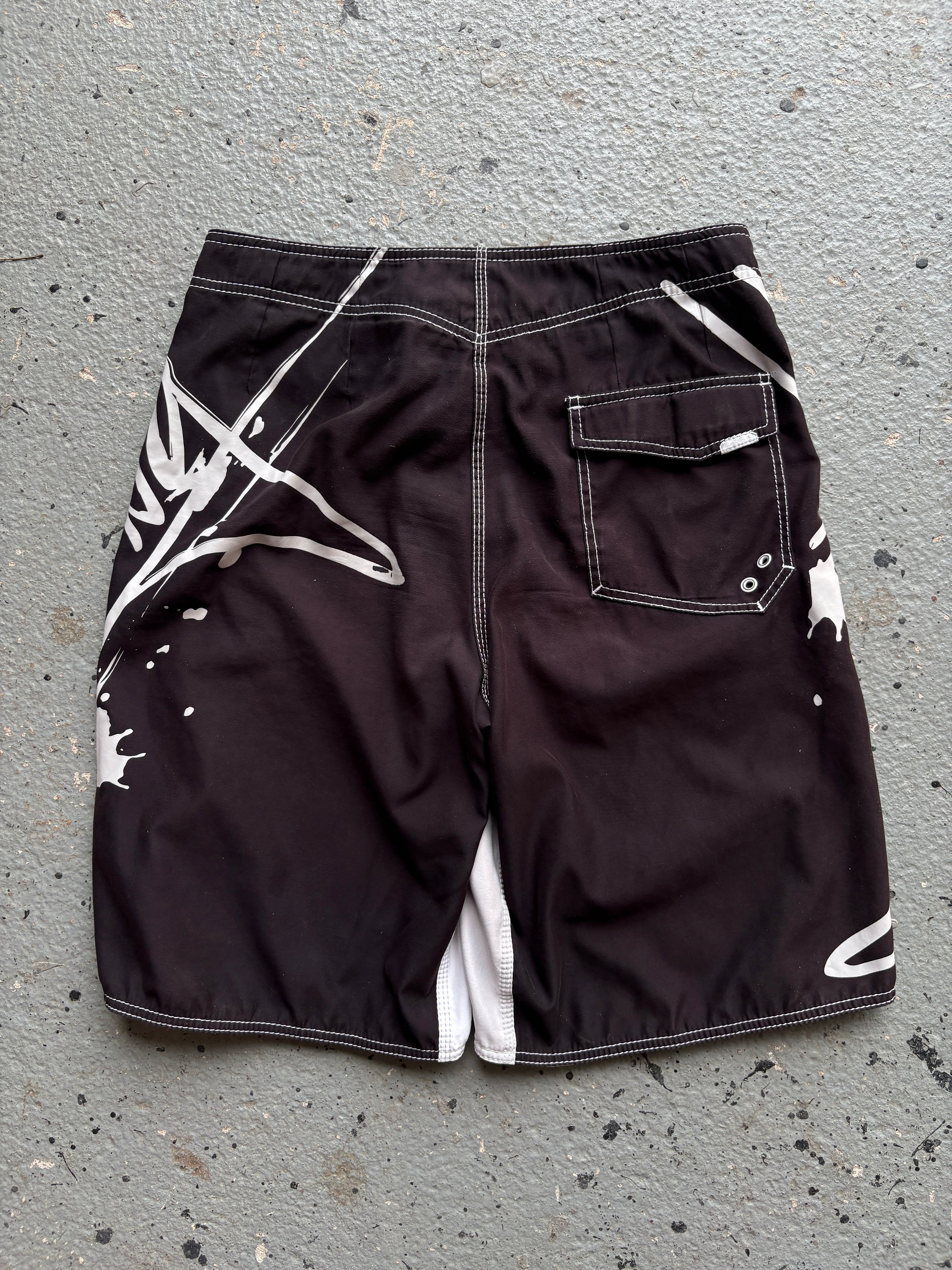 2000s Billabong "Occy Has A Possy" Board Shorts Black / White