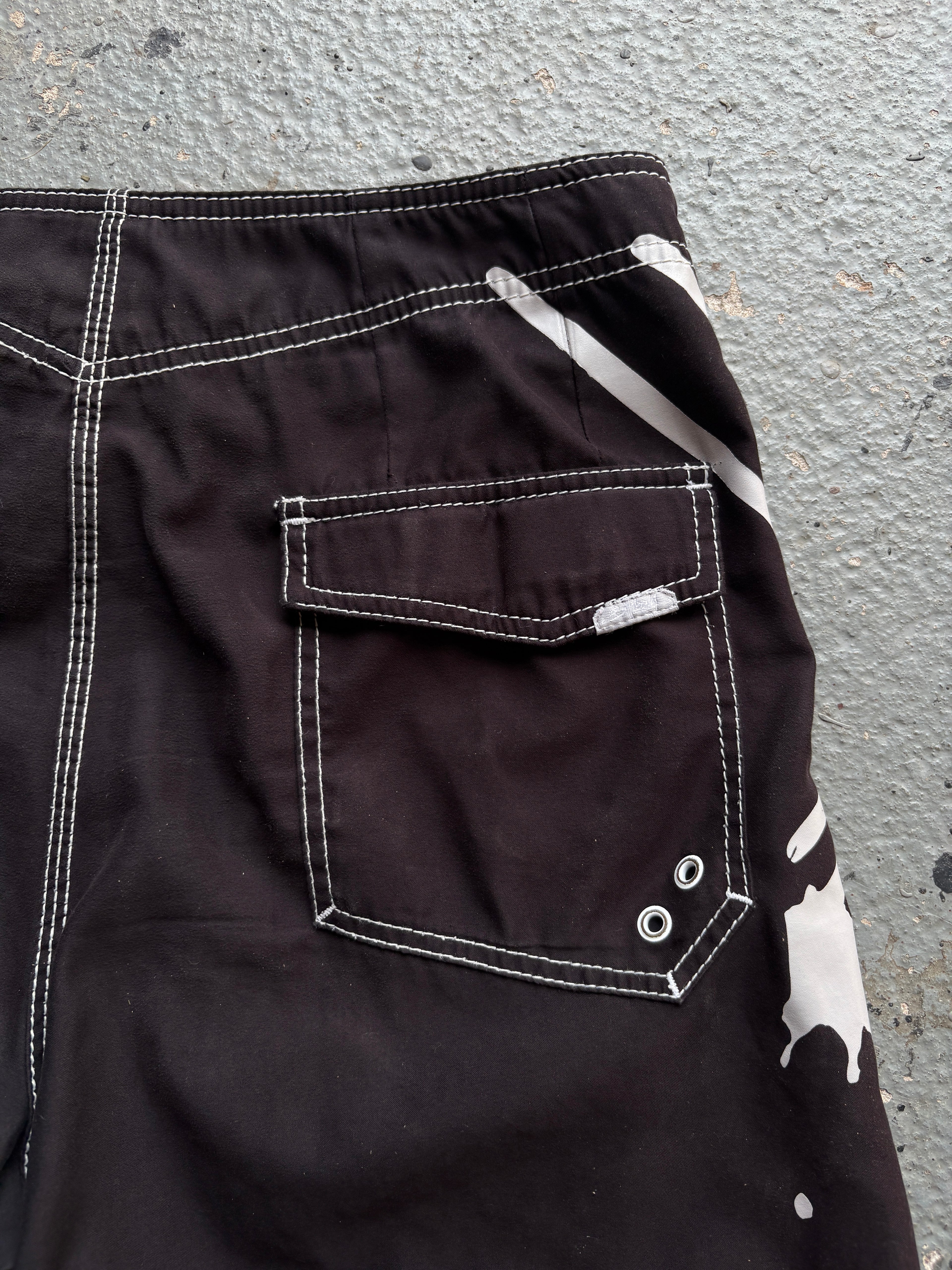 2000s Billabong "Occy Has A Possy" Board Shorts Black / White